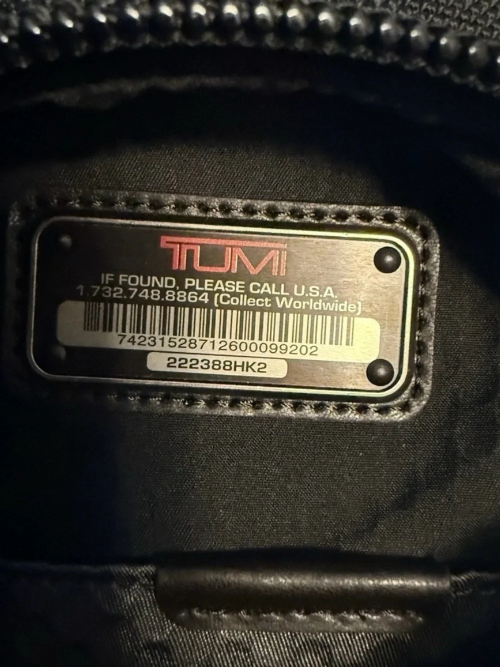 Tumi Black Roll-Top Backpack with Leather Base